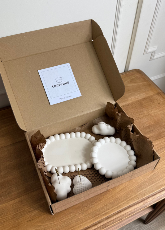 Mise en scène du colis du Pack Souvenir Bubble.