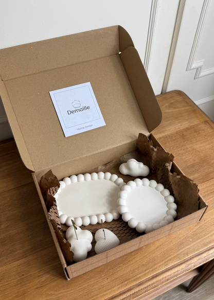 Mise en scène du colis du Pack Souvenir Bubble.