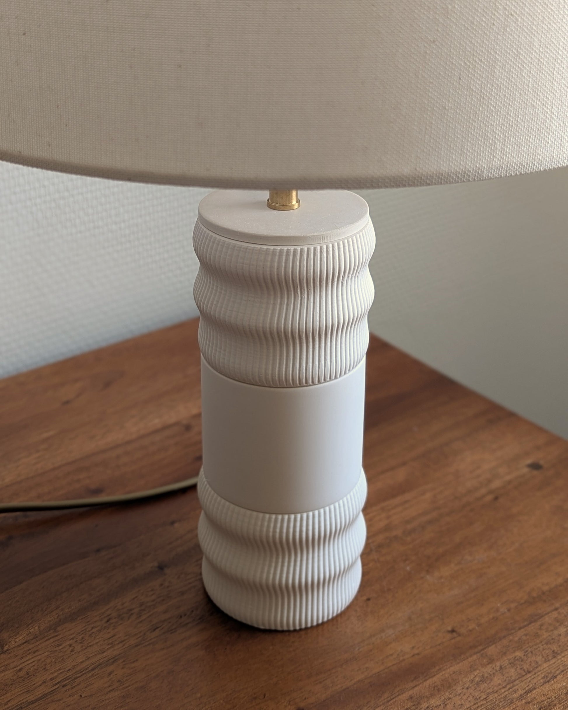 Zoom sur Lampe Flamme Blanche de Maison Demaille.