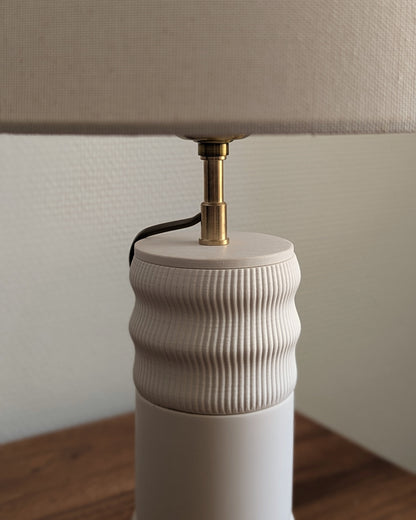 Zoom sur rehausseur de la Lampe Flamme Blanche de Maison Demaille.